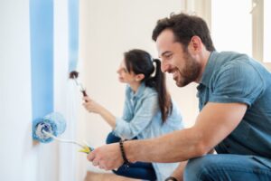 Homeowners Completing DIY Painting Tasks